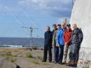 Standing next to the EME array (L-R): OH6ZZ, OH2BH, OH8MSM, OH6KZP, OH2TA, and OH2GEK.